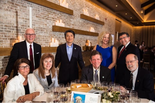Gathered around their table at the Dinner Party for a group photo are (L to R): Linda Chakrin, former Seeing Eye Trustee Louis Chakrin, Ginger Kutsch, Seeing Eye Trustee OhSang Kwon, Seeing Eye President & CEO Jim Kutsch, Amy Bucco, Assemblyman Anthony Bucco, former Seeing Eye President & CEO Ken Rosenthal 
